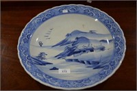 Oriental platter, river landscape decoration