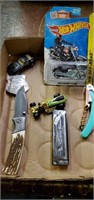 Flat of misc. Knife, toy cars, harmonica