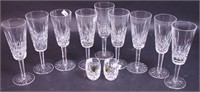 Nine 7" Waterford crystal flutes and two 2"