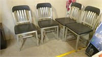 Four metal chairs