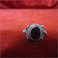 Sterling silver ring. Red stone.