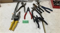 Hole Punch, tin snips, locking pliers and more.