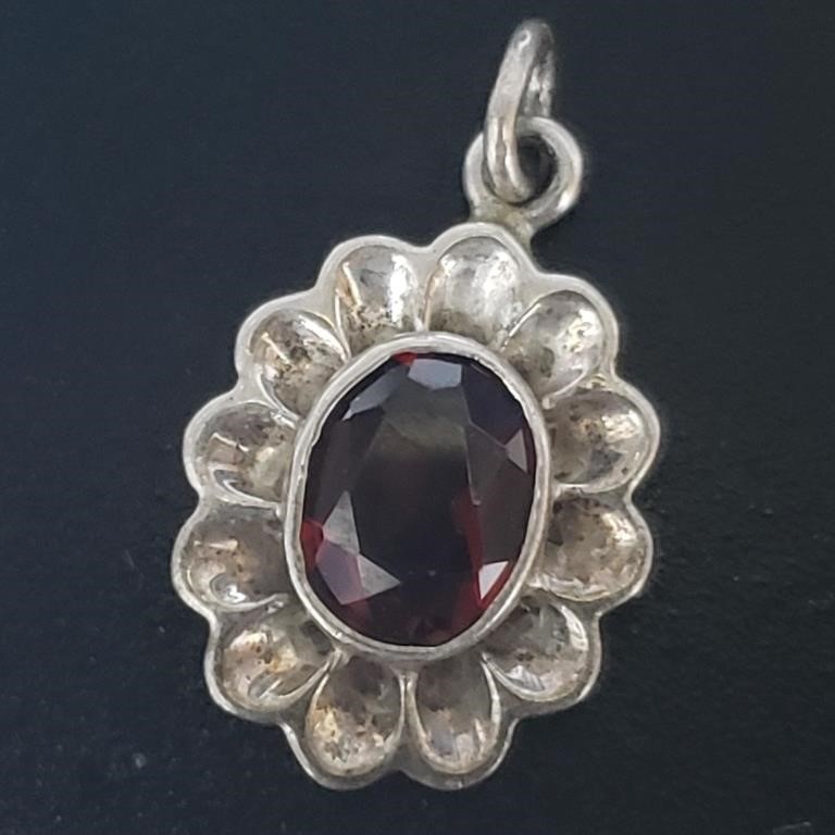 $100 Silver Garnet Pendant