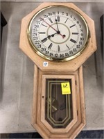 Modern oak case 31 day wall clock with pendulum