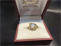 Gold Ring Opal Center and 2 side CZs SZ6
