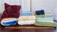 Lot of towels, blankets, curtains, & pillow