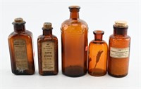 Qty of antique amber medicine bottles by Lysol,