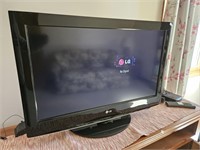 LG 32" TV w/ remote. Works. Sony DVD player and