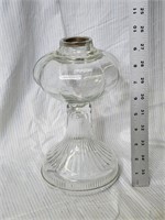 Clear oil lamp with damage