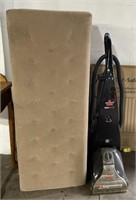 (A) Upholstered Bench missing Leg, Bissel Vacuum