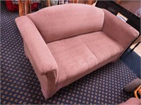 Low brown upholstered loveseat, 60" x 30" x 30"