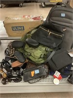 Assorted fashion bags and sunglasses