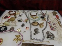 Showcase of large good costume jewelry collection.