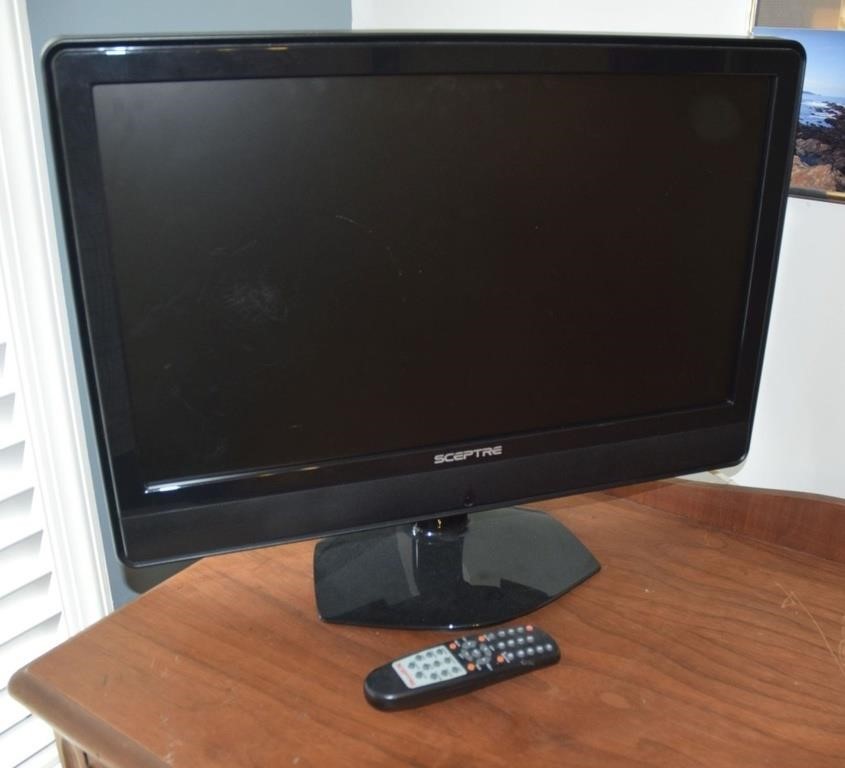 Sceptre television monitor with remote control; as