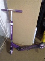 Purple foldable child's Mongoose scooter