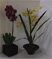 Lot of two faux orchids in composite pots.