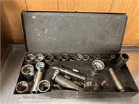 Metal box of assorted sockets