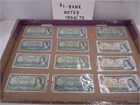 12 - 1954 and 1973 one dollar bills