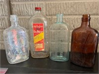 Vintage embossed bottles