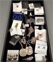 Group of sterling jewelry including brooches,