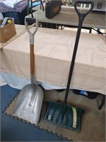 2 snow shovels. 1 plastic and 1 metal