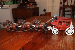 Cast iron stage coach and horses