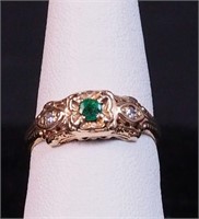 A 14K gold ring with diamonds and