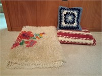 Afghan, pillow, and throw rug
