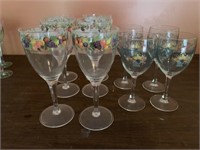 6 plastic wine glasses with fruit design and 4