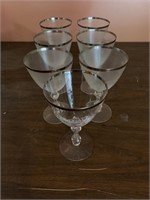 7 etched stemmed wine glasses with etched