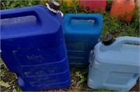Lot of 3 plastic cans. 6 Gal. # Gal.