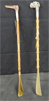 Pair of dog-head shoe horns, 21"l.