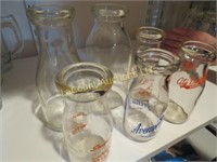 assorted vintage milk bottles
