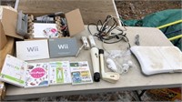 Wii console, Wii fit, 2 full controllers, games