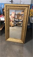 Very large gold tone mirror