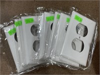 Eight White Outlet Covers