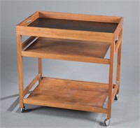 Tea cart with tray and 2 shelves.