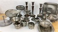 Pewter serving ware, candle stick holders etc,