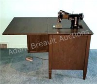 Vintage Necchi sewing machine and cabinet, made