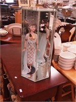 Highly adorned "Gene" doll in glass case, 20" high