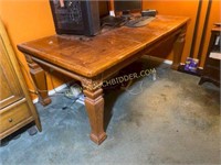 large clunky leg solid wood table