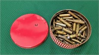 TIN FULL OF EARLY BULLETS