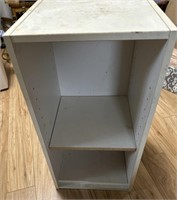 Small white shelf approx 3 ft tall