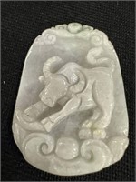 Rare white jade carved Bull pendant, 2” by 2-1/4”