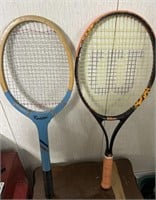 Two tennis rackets one Wilson one revelation