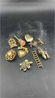 Variety of vintage pins and brooch