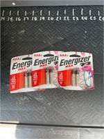 Three packs of AAA batteries.