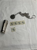 Victor Dana keychain on chain, A Root of