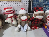 3 BATTERY OPERATED SOCK MONKEYS