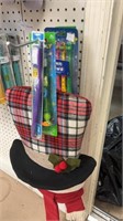 Kids toothbrushes and snowman hanger